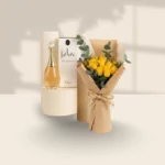 عطر J’adore مع الورود الصفراء المشرقة